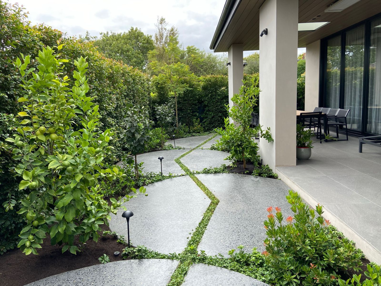 Lawn and generous perennial borders